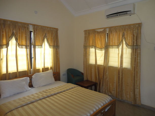 Imagen de la habitación del Hotel Tenack Beach Resort and. Foto 2
