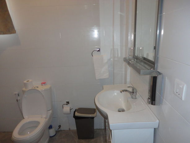 Imagen de la habitación del Hotel Tenack Beach Resort and. Foto 4