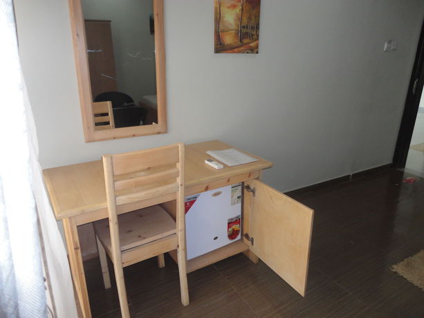 Imagen de la habitación del Hotel Tenack Beach Resort and. Foto 5