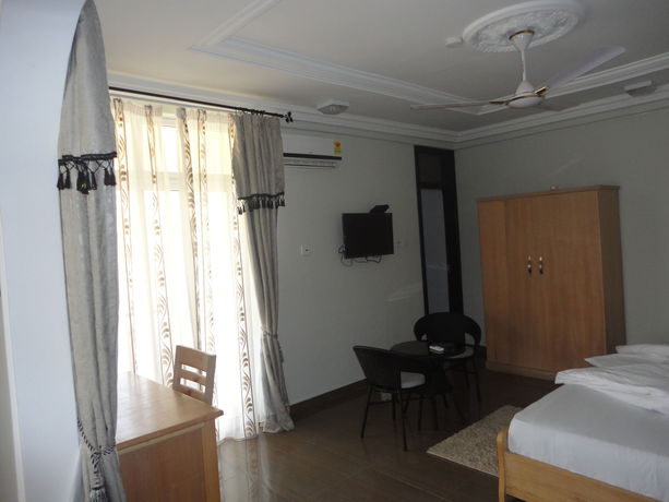 Imagen de la habitación del Hotel Tenack Beach Resort and. Foto 9