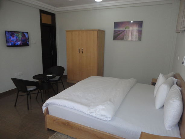 Imagen de la habitación del Hotel Tenack Beach Resort and. Foto 12