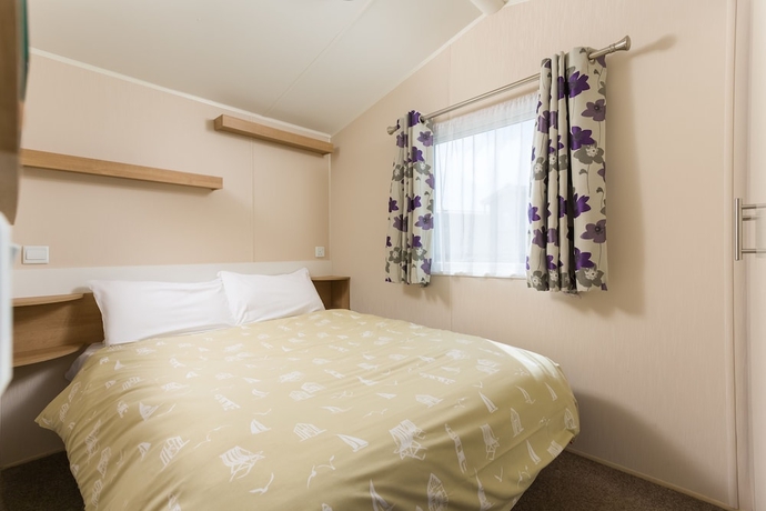 Imagen de la habitación del Hotel Tencreek Holiday Park. Foto 13
