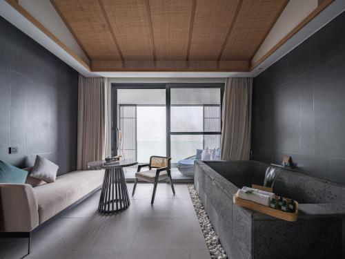 Imagen general del Hotel Tengchong Jingge Banshan Hot Spring. Foto 3