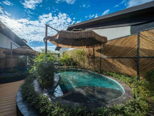 Imagen general del Hotel Tengchong Jingge Banshan Hot Spring. Foto 4