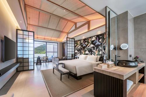 Imagen de la habitación del Hotel Tengchong Jingge Banshan Hot Spring. Foto 16