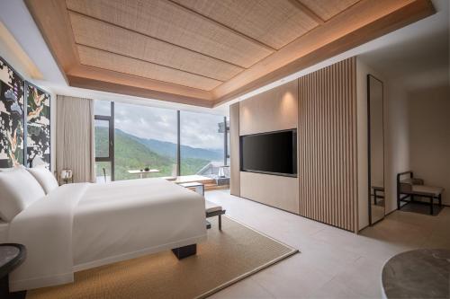 Imagen de la habitación del Hotel Tengchong Jingge Banshan Hot Spring. Foto 17