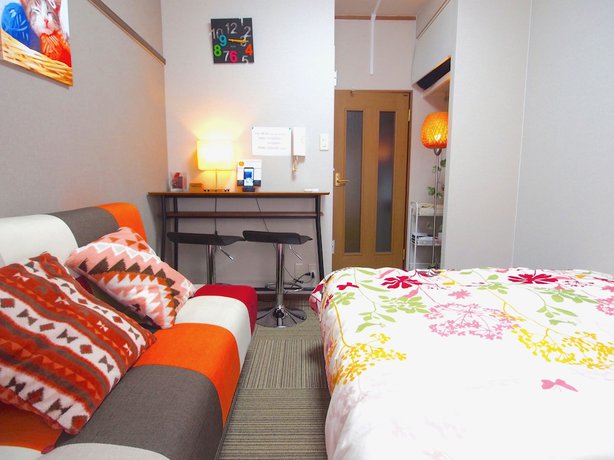 Imagen de la habitación del Hotel Tenjin. Foto 16