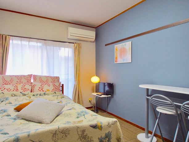 Imagen de la habitación del Hotel Tenjin. Foto 19