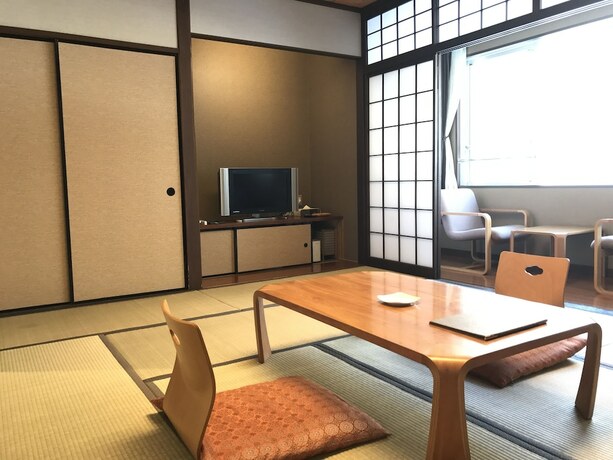 Imagen de la habitación del Hotel Tenjin Lodge. Foto 10
