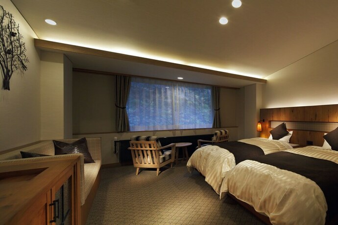 Imagen de la habitación del Hotel Tenjin Lodge. Foto 12