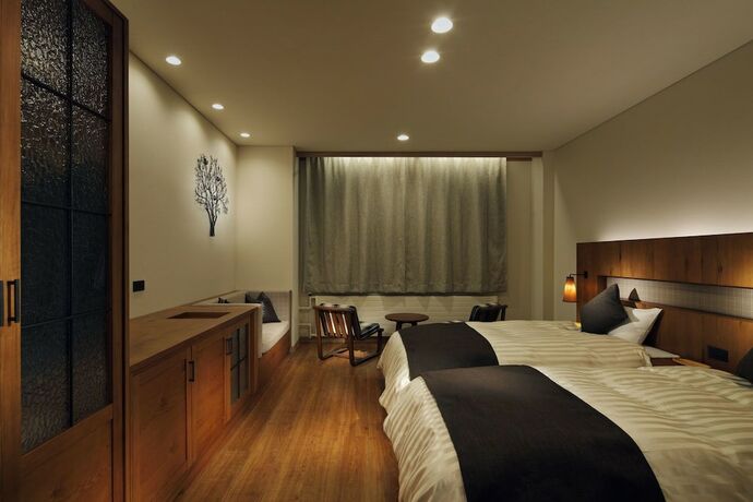 Imagen de la habitación del Hotel Tenjin Lodge. Foto 13