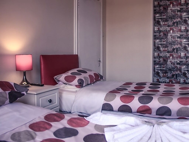 Imagen de la habitación del Hotel Tennyson House. Foto 9