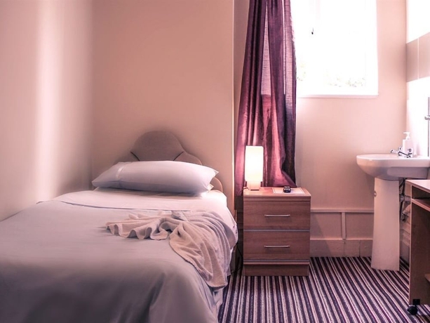 Imagen de la habitación del Hotel Tennyson House. Foto 11