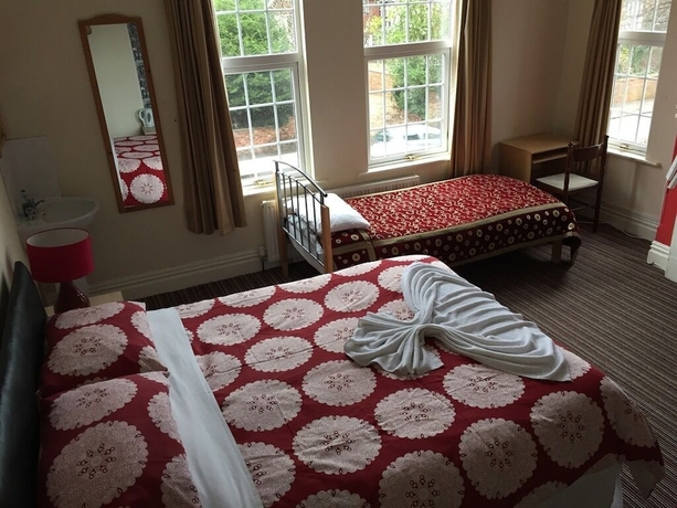 Imagen de la habitación del Hotel Tennyson House. Foto 15