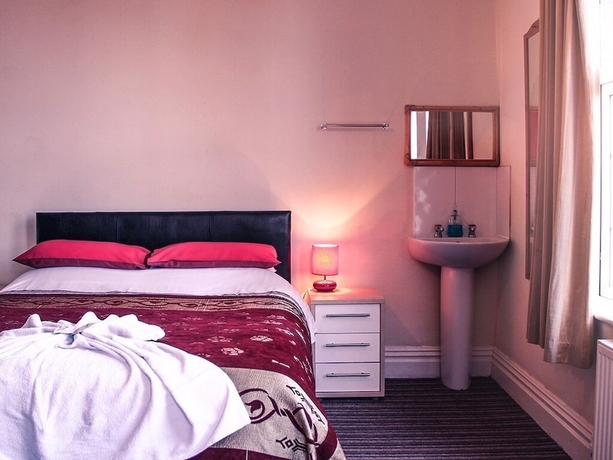 Imagen de la habitación del Hotel Tennyson House. Foto 16