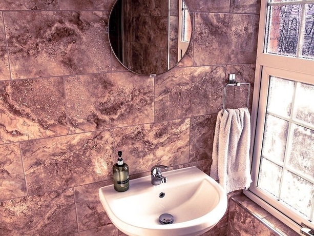 Imagen de la habitación del Hotel Tennyson House. Foto 18