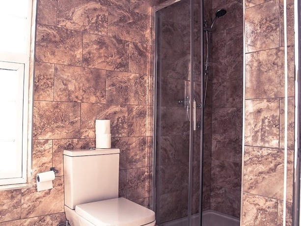 Imagen de la habitación del Hotel Tennyson House. Foto 19