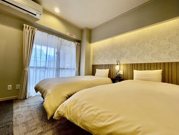 Imagen de la habitación del Hotel Tenshi-Kan Kumoji. Foto 5