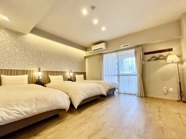 Imagen de la habitación del Hotel Tenshi-Kan Kumoji. Foto 6