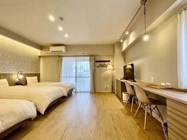 Imagen de la habitación del Hotel Tenshi-Kan Kumoji. Foto 7
