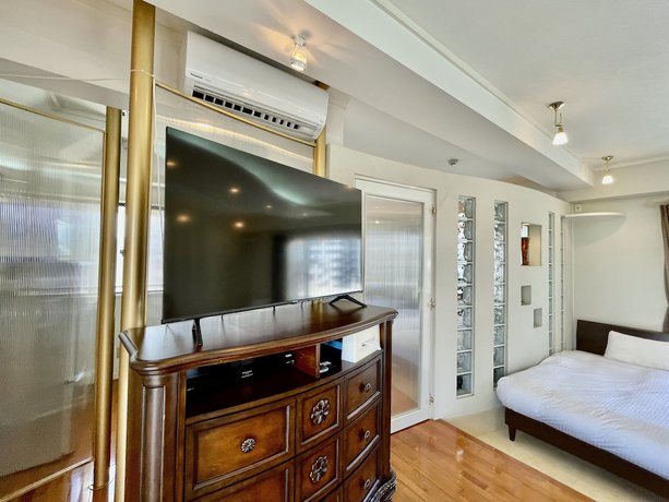 Imagen de la habitación del Hotel Tenshi-Kan Kumoji. Foto 12