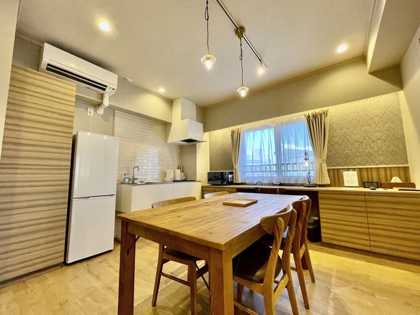 Imagen de la habitación del Hotel Tenshi-Kan Kumoji. Foto 19