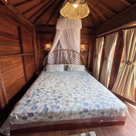 Imagen de la habitación del Hotel Tentrem Bungalow. Foto 2