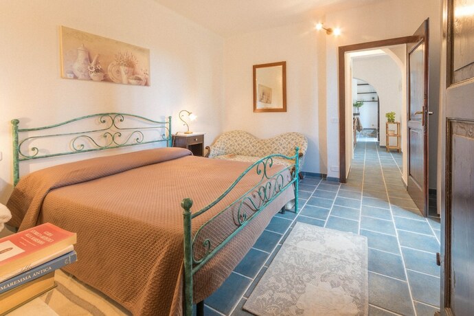 Imagen de la habitación del Hotel Tenuta Di Poggio Cavallo. Foto 13