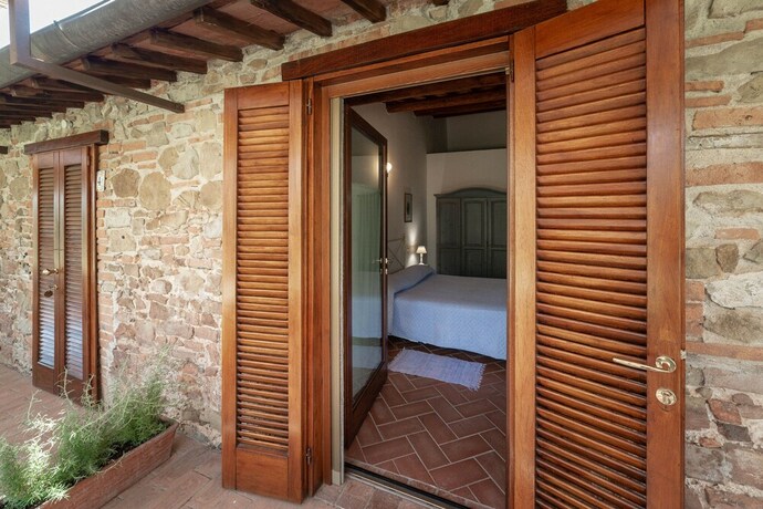 Imagen de la habitación del Hotel Tenuta Di Poggio Cavallo. Foto 14