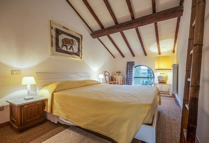 Imagen de la habitación del Hotel Tenuta Di Poggio Cavallo. Foto 32