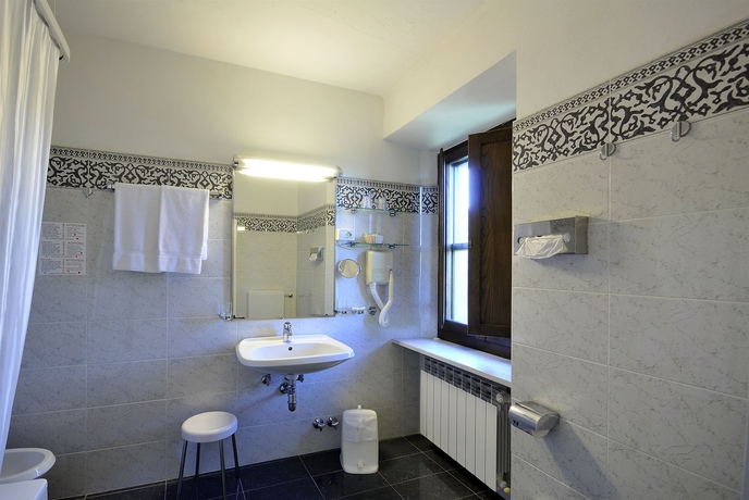 Imagen de la habitación del Hotel Tenuta Di Ricavo. Foto 11