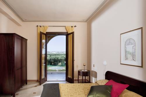 Imagen de la habitación del Hotel Tenuta La Baronessa Resort. Foto 5