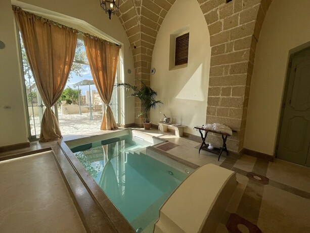 Imagen de la habitación del Hotel Tenuta Mosè Charming House Relais. Foto 11