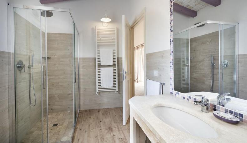 Imagen de la habitación del Hotel Tenuta Pilastru. Foto 15