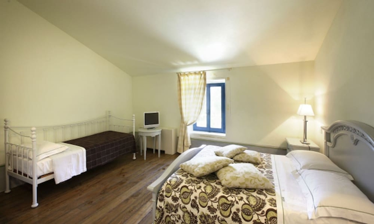 Imagen de la habitación del Hotel Tenuta Santi Giacomo E Filippo. Foto 17