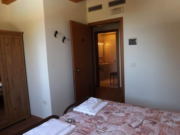 Imagen de la habitación del Hotel Tenuta Villa Colle Sereno. Foto 13