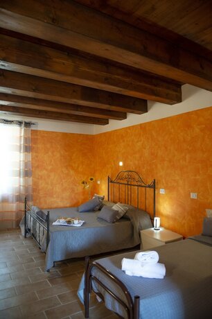 Imagen de la habitación del Hotel Tenuta Villa Colle Sereno. Foto 17