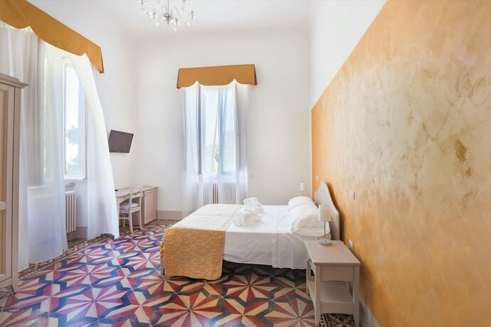 Imagen de la habitación del Hotel Tenuta Villa Colle Sereno. Foto 18