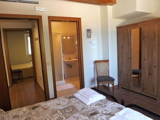 Imagen de la habitación del Hotel Tenuta Villa Colle Sereno. Foto 19
