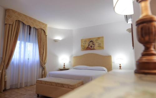 Imagen de la habitación del Hotel Tenute Al Bano. Foto 16