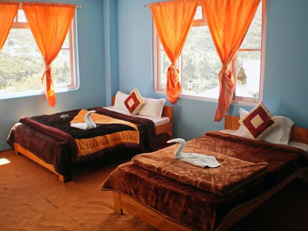 Imagen de la habitación del Hotel Tenzing Retreat. Foto 16