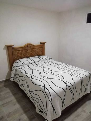 Imagen de la habitación del Hotel Tepehuakan. Foto 11