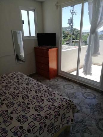 Imagen de la habitación del Hotel Tepehuakan. Foto 13