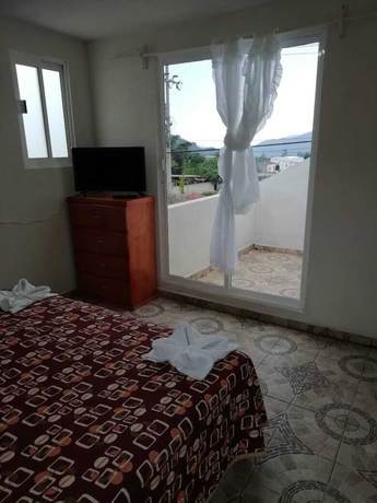 Imagen de la habitación del Hotel Tepehuakan. Foto 15