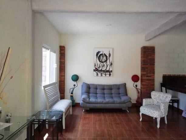 Imagen de la habitación del Hotel Tepehuakan. Foto 16