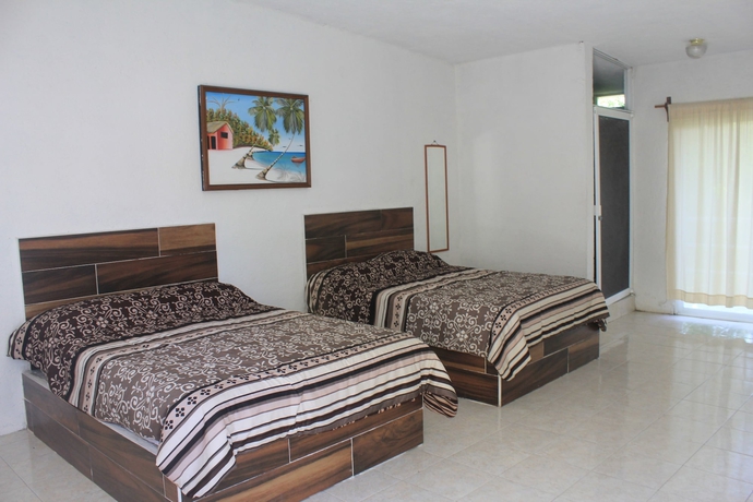 Imagen de la habitación del Hotel Teques Inn. Foto 4