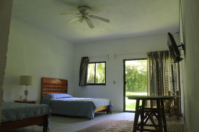 Imagen de la habitación del Hotel Teques Inn. Foto 6