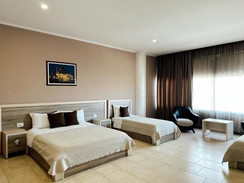 Imagen de la habitación del Hotel Terminal Tirana. Foto 13