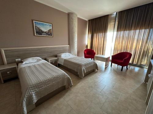 Imagen de la habitación del Hotel Terminal Tirana. Foto 16