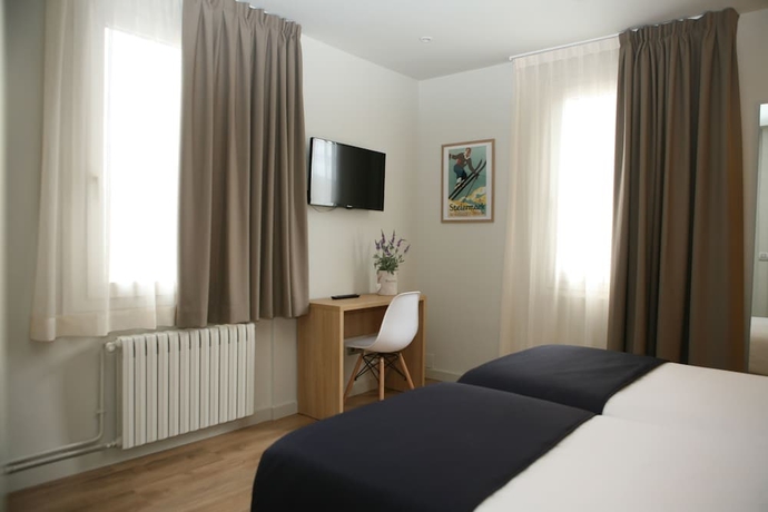 Imagen de la habitación del Hotel Terminus Puigcerdà. Foto 11